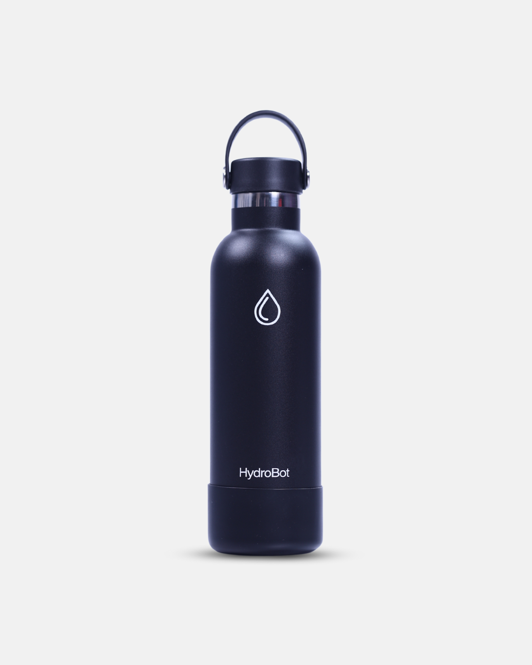 Person holding an orange HydroBot water bottle outdoors with green plants in the background.