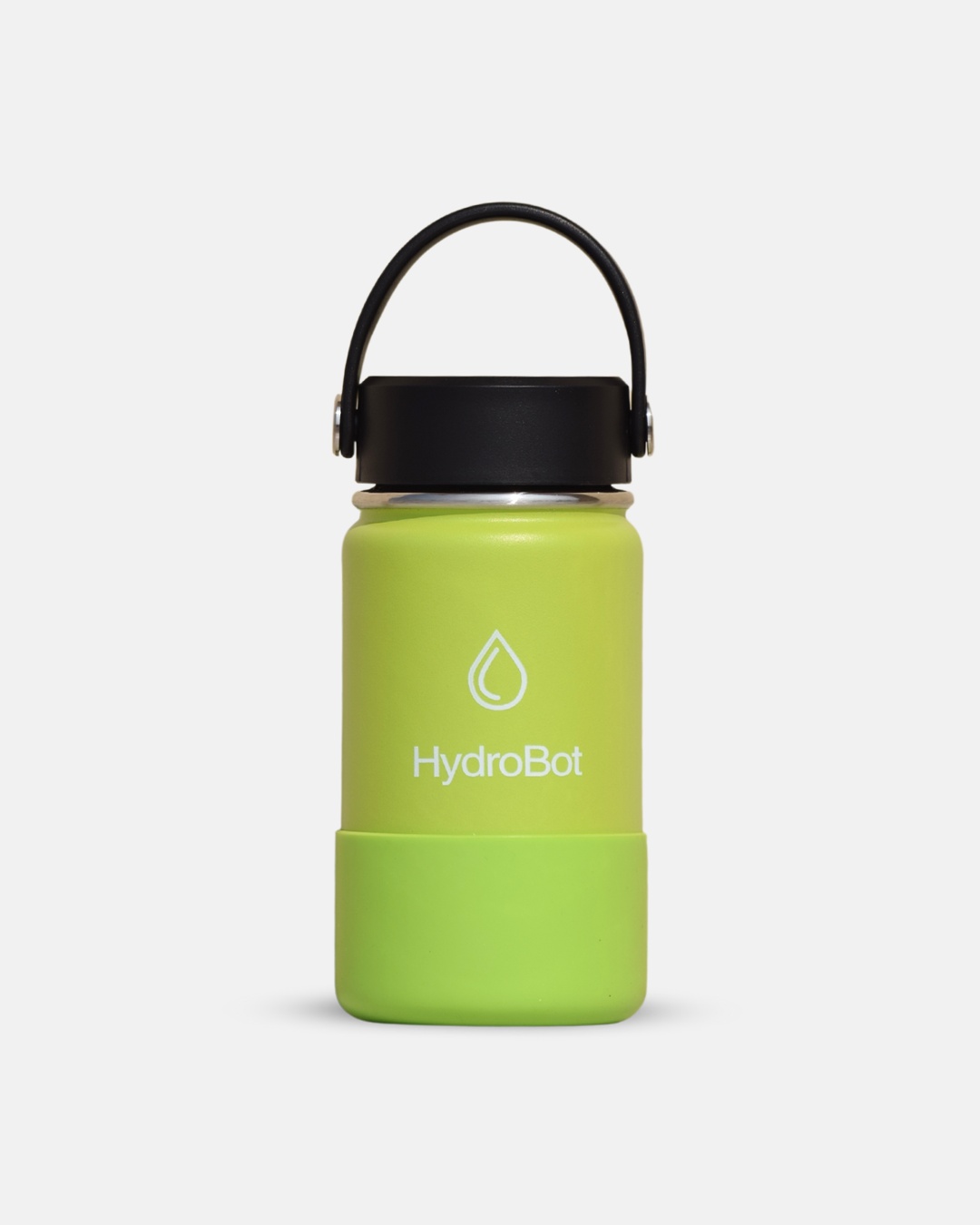 Person holding an orange HydroBot water bottle outdoors with green plants in the background.